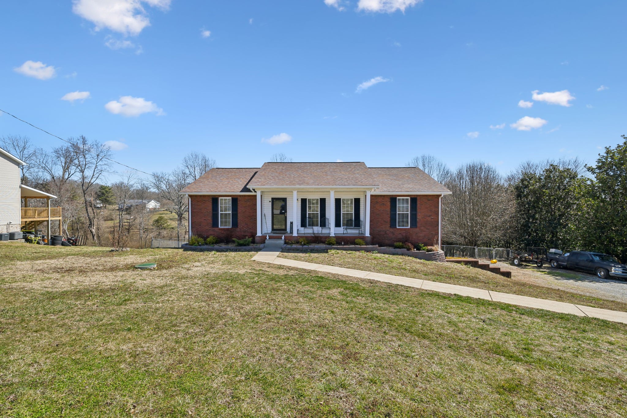 819 Blakemore Road Dickson, TN 37055 - Photo 7 of 54 a front view of a house with a yard