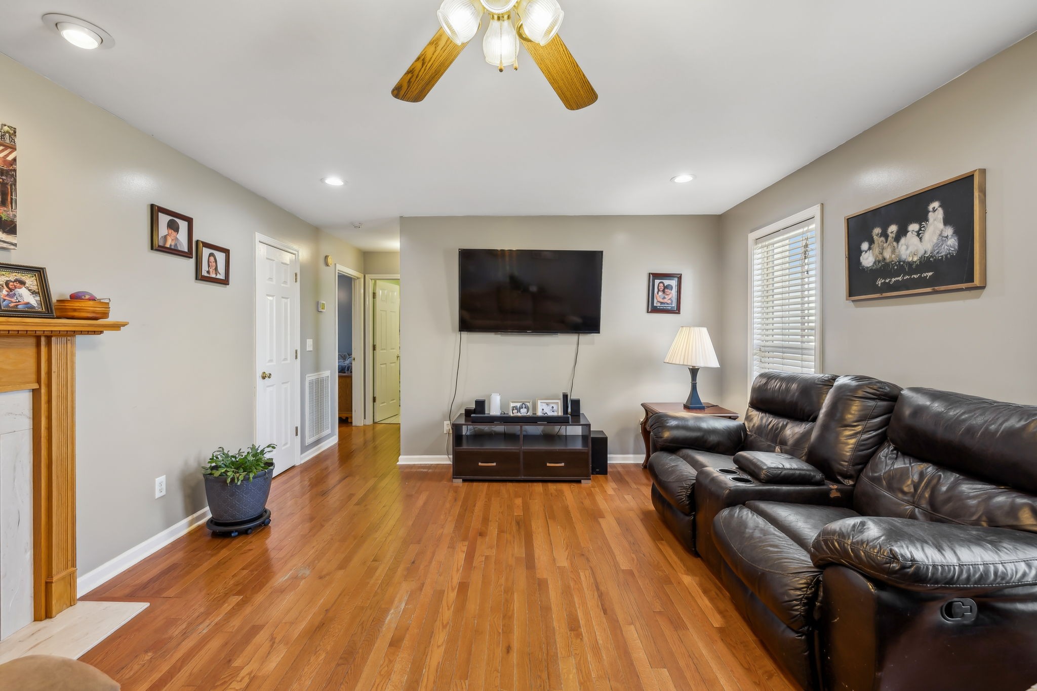 819 Blakemore Road Dickson, TN 37055 - Photo 8 of 54 a living room with furniture and a flat screen tv