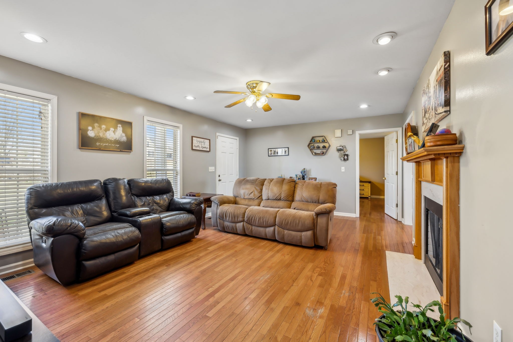 819 Blakemore Road Dickson, TN 37055 - Photo 9 of 54 a living room with furniture and a chandelier