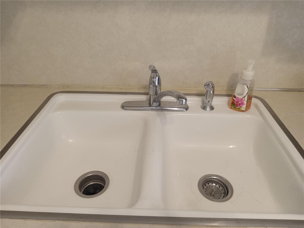 2427 Rhodesian Drive, Unit 11 Clearwater, FL 33763 - Photo 9 of 44 a close view of sink
