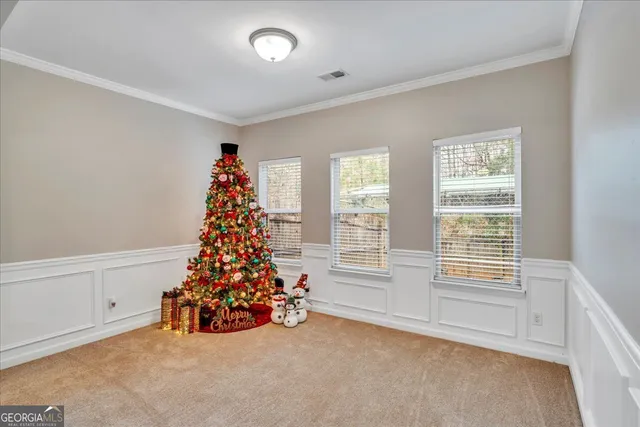 a large room with toys and a window