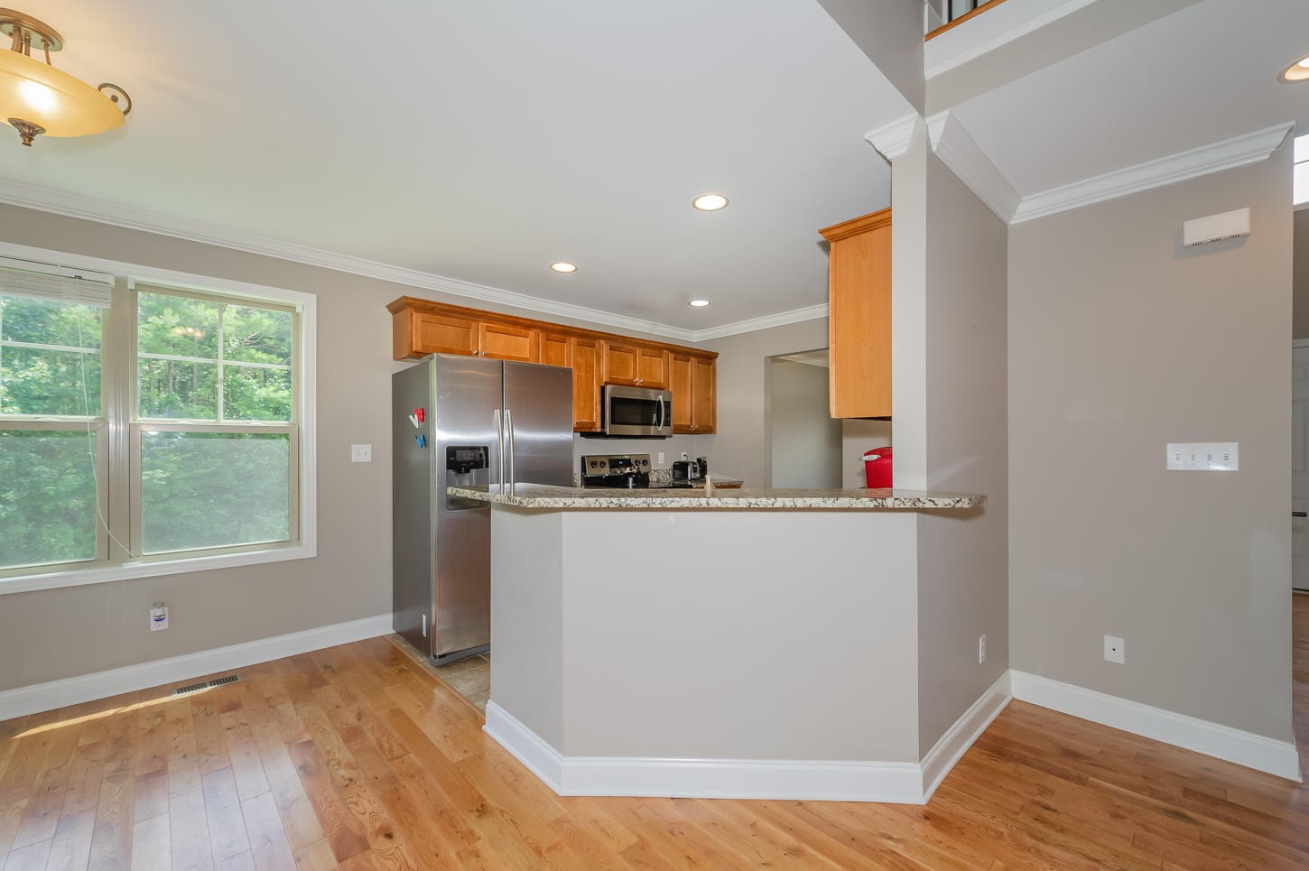159 Crossroads Boulevard Oak Ridge, TN 37830 - Photo 11 of 28 a kitchen with stainless steel appliances a refrigerator and a stove top oven