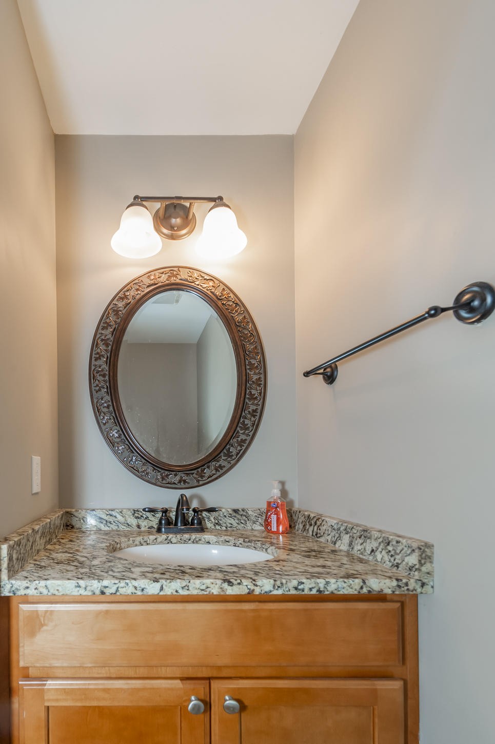 159 Crossroads Boulevard Oak Ridge, TN 37830 - Photo 13 of 28 a bathroom with a granite countertop sink and a mirror