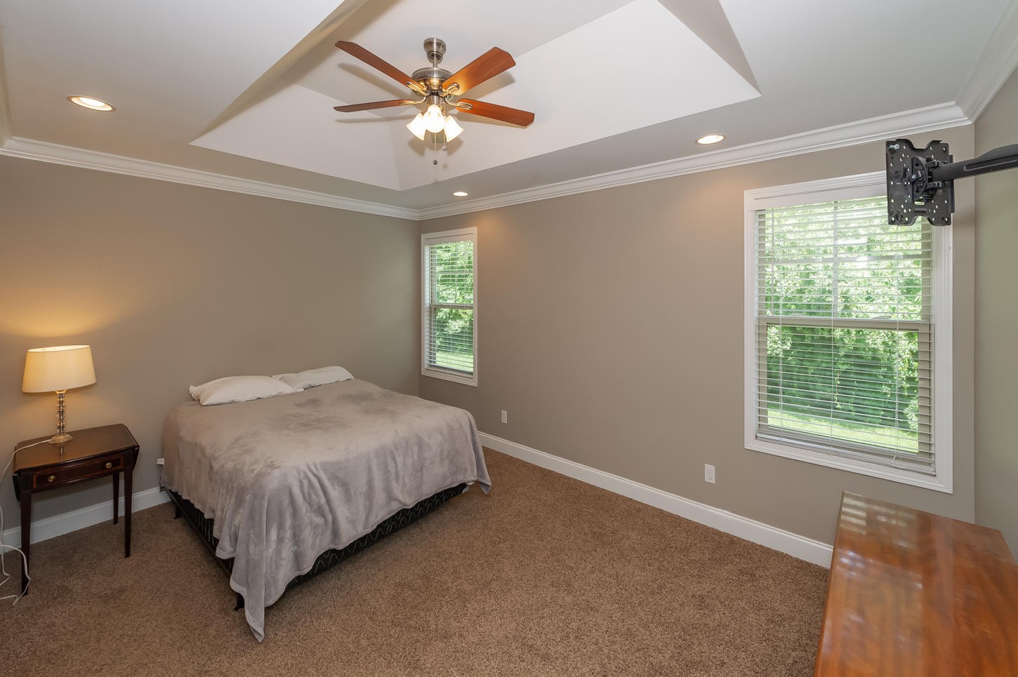 159 Crossroads Boulevard Oak Ridge, TN 37830 - Photo 14 of 28 a bedroom with a bed and a chandelier
