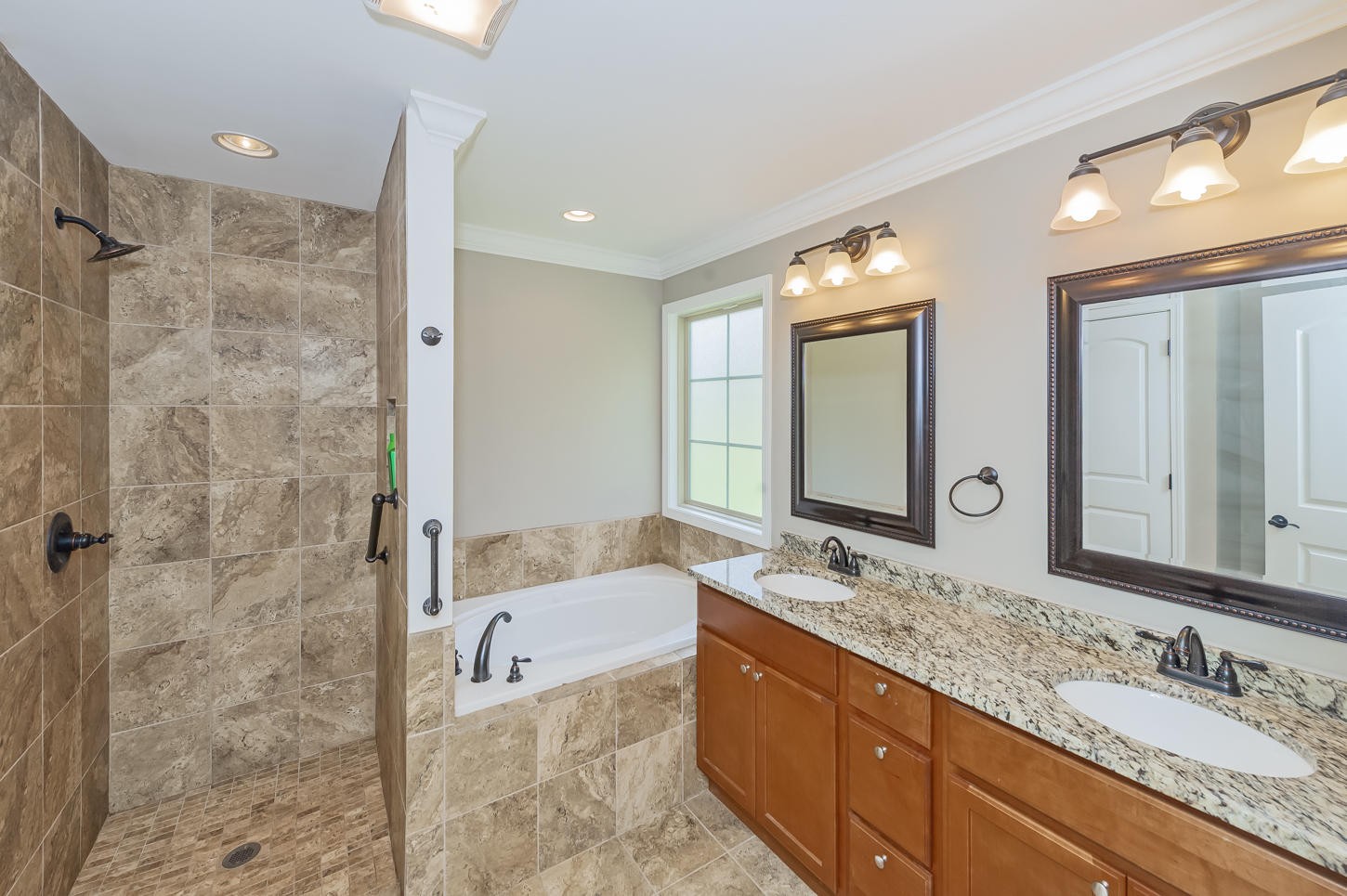 159 Crossroads Boulevard Oak Ridge, TN 37830 - Photo 16 of 28 a bathroom with a granite countertop double vanity sink mirror and shower