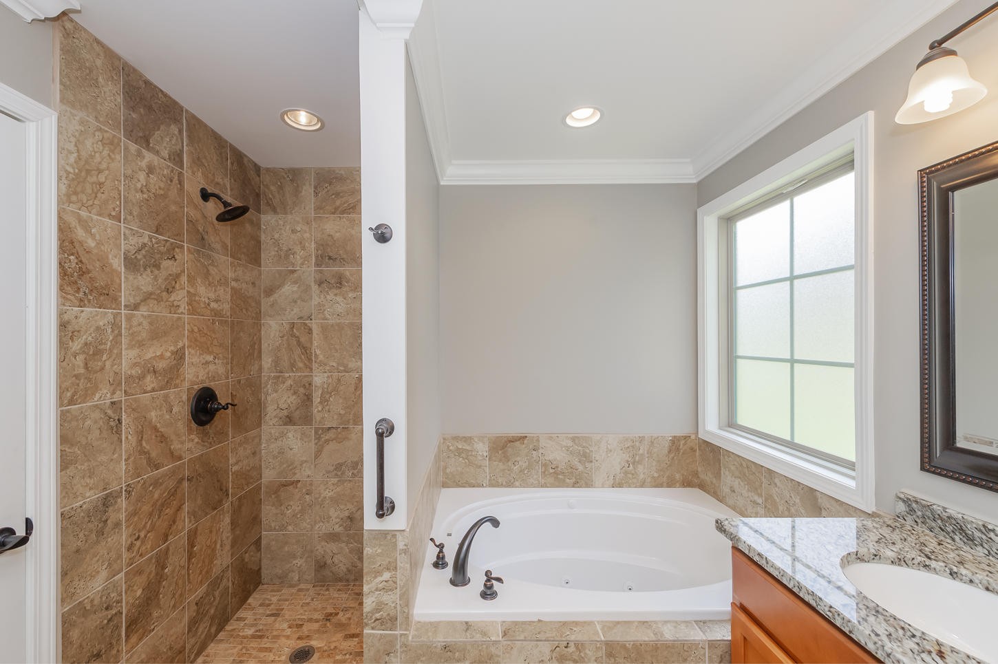 159 Crossroads Boulevard Oak Ridge, TN 37830 - Photo 17 of 28 a bathroom with a granite countertop tub sink and shower
