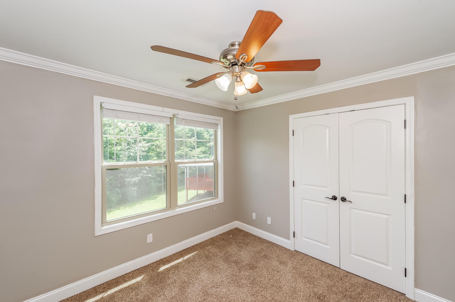 159 Crossroads Boulevard Oak Ridge, TN 37830 - Photo 19 of 28 an empty room with windows and fan