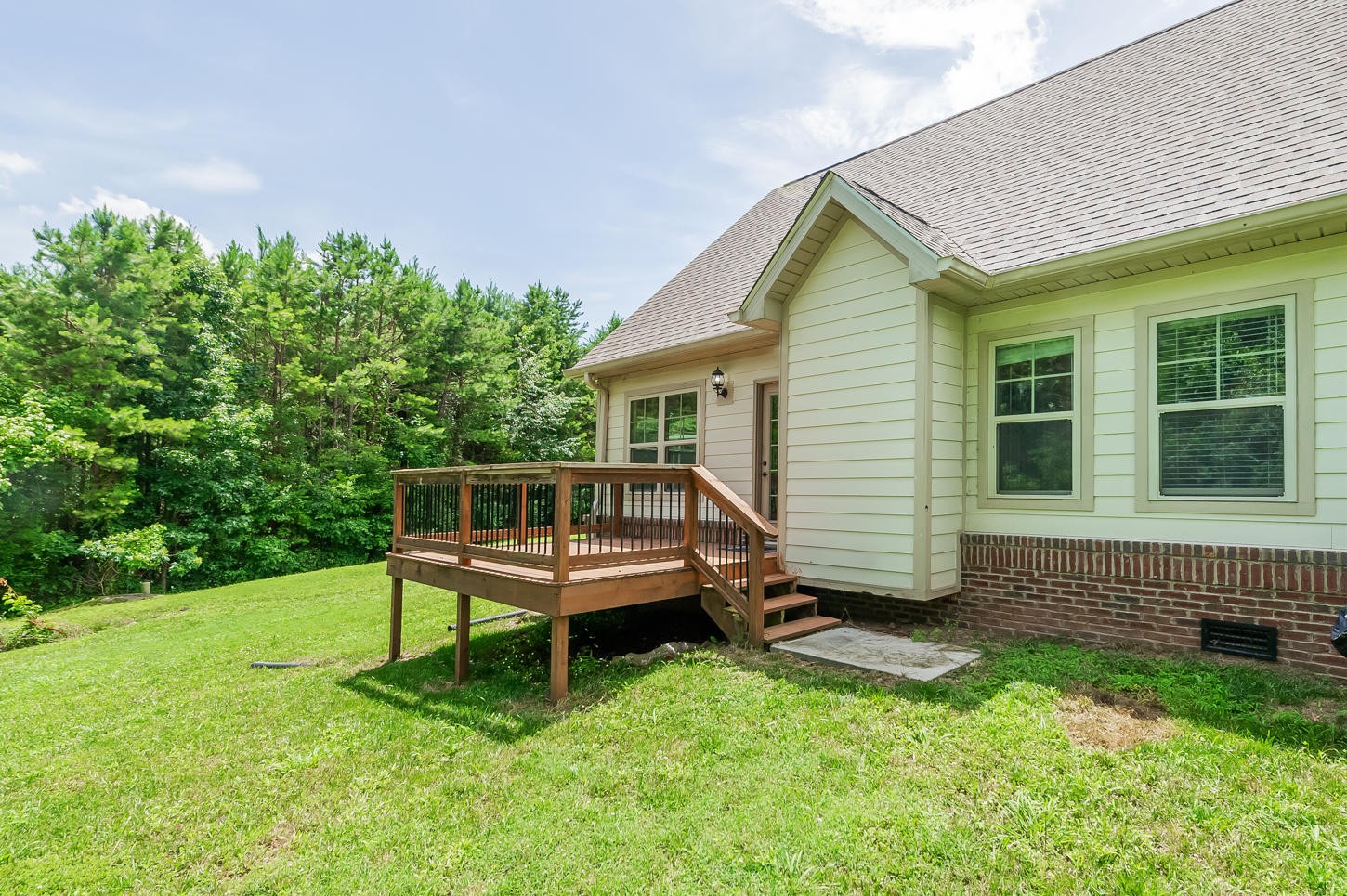 159 Crossroads Boulevard Oak Ridge, TN 37830 - Photo 25 of 28 a house view with a garden space