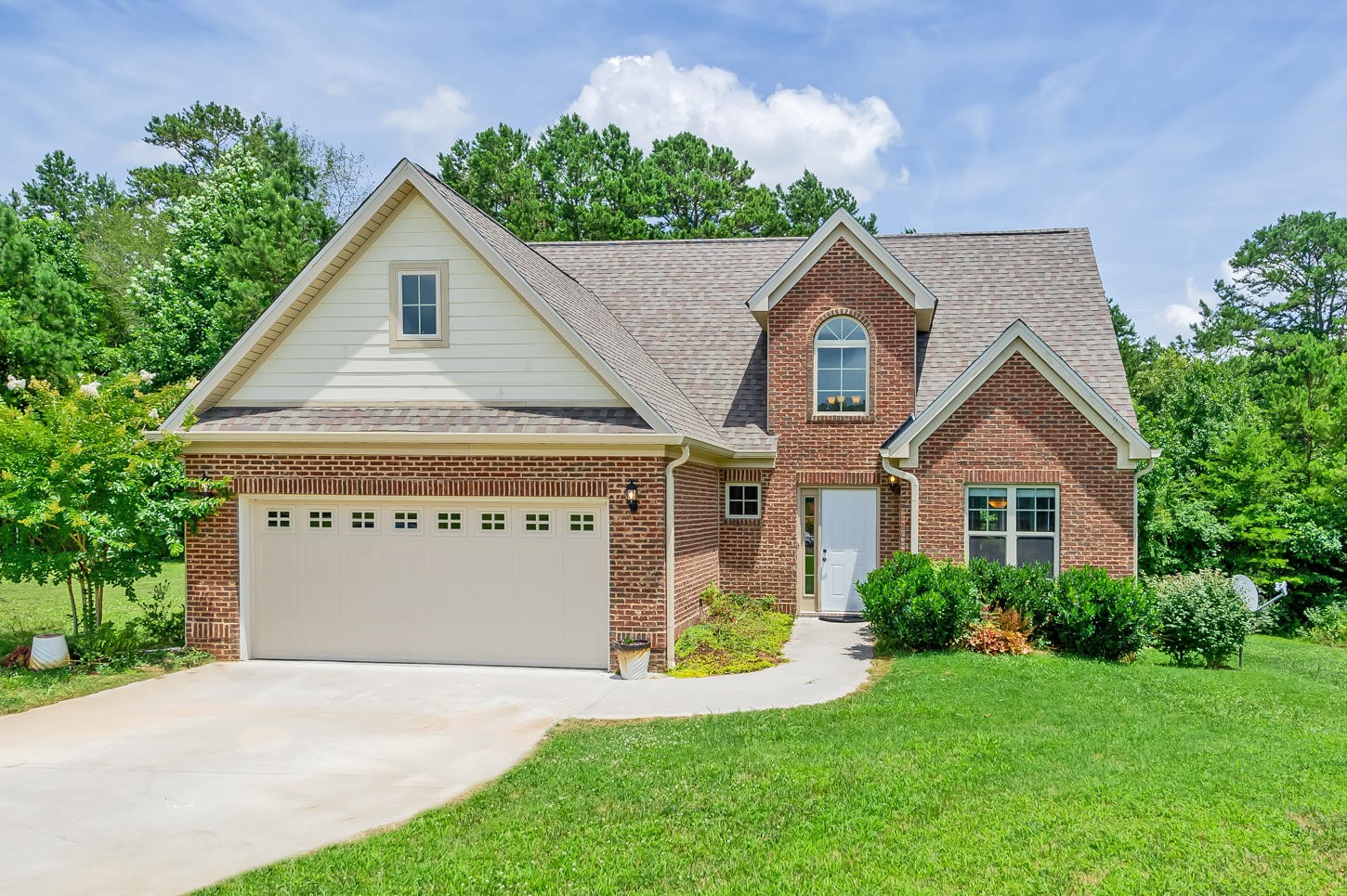 159 Crossroads Boulevard Oak Ridge, TN 37830 - Photo 28 of 28 a front view of a house with a yard and garage