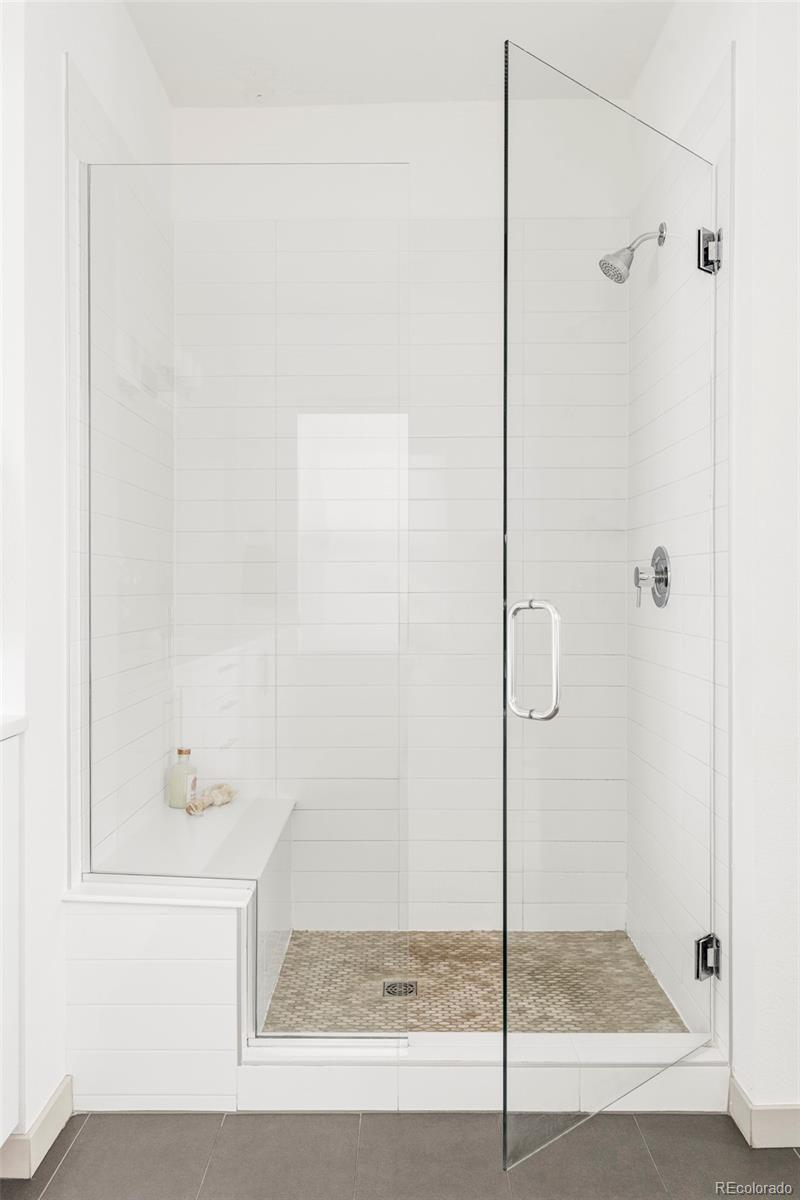 4015 Fenton Court Wheat Ridge, CO 80212 - Photo 13 of 31 a bathroom with a shower