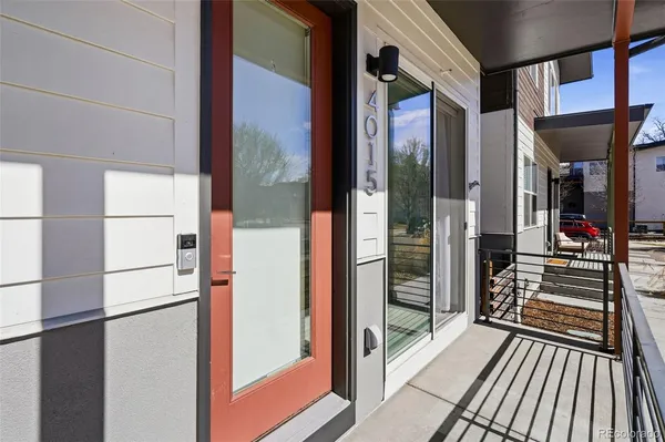 a view of balcony and wooden floor