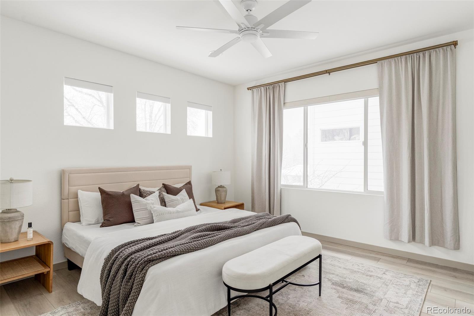4015 Fenton Court Wheat Ridge, CO 80212 - Photo 10 of 31 a bedroom with a bed and a window