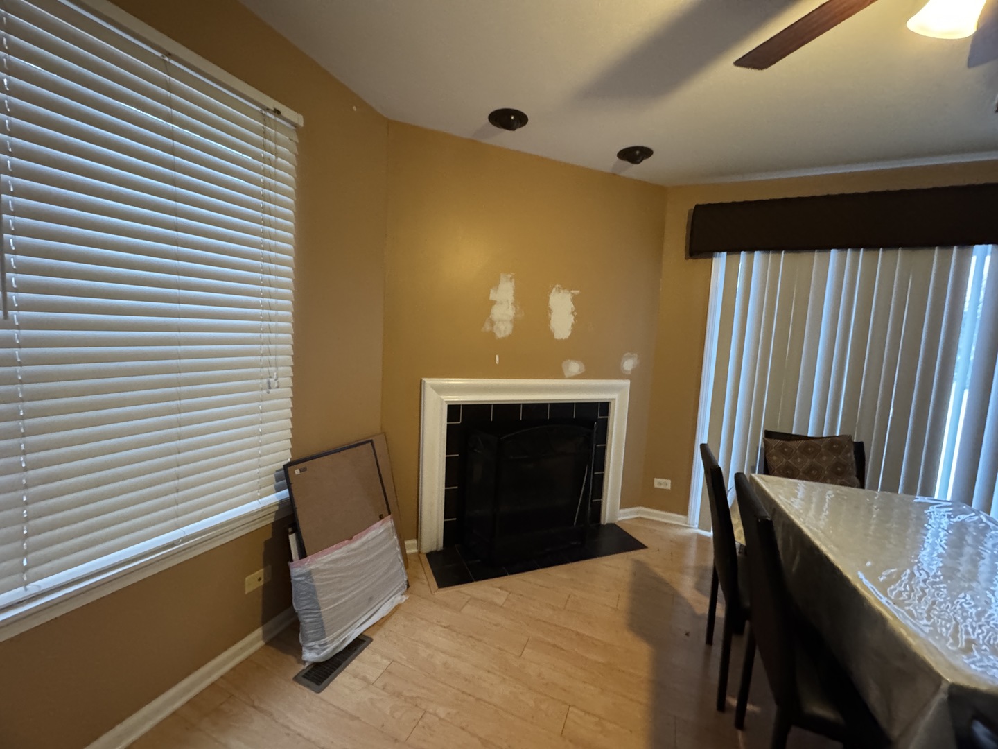 3281 Cool Springs Court Naperville, IL 60564 - Photo 4 of 16 a bedroom with a bed and a fireplace