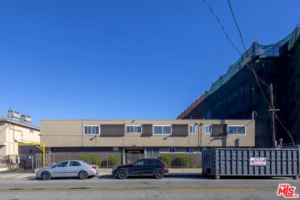 a car parked in front of a building