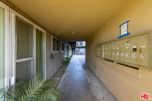 a view of a building with sitting area