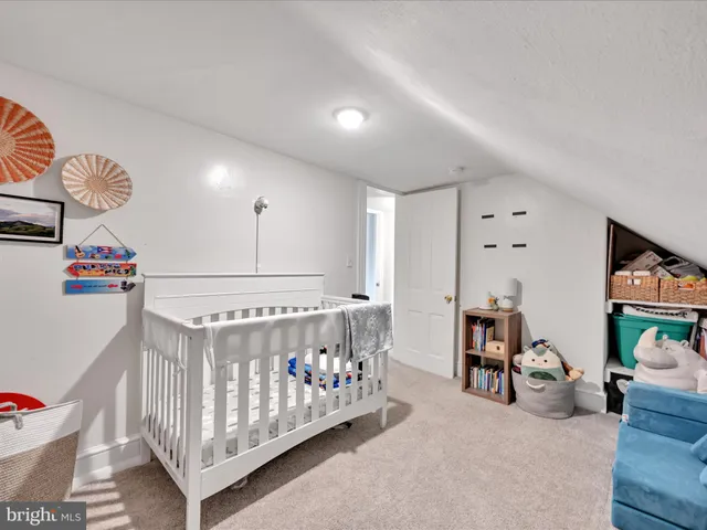 a bedroom with furniture and a bed