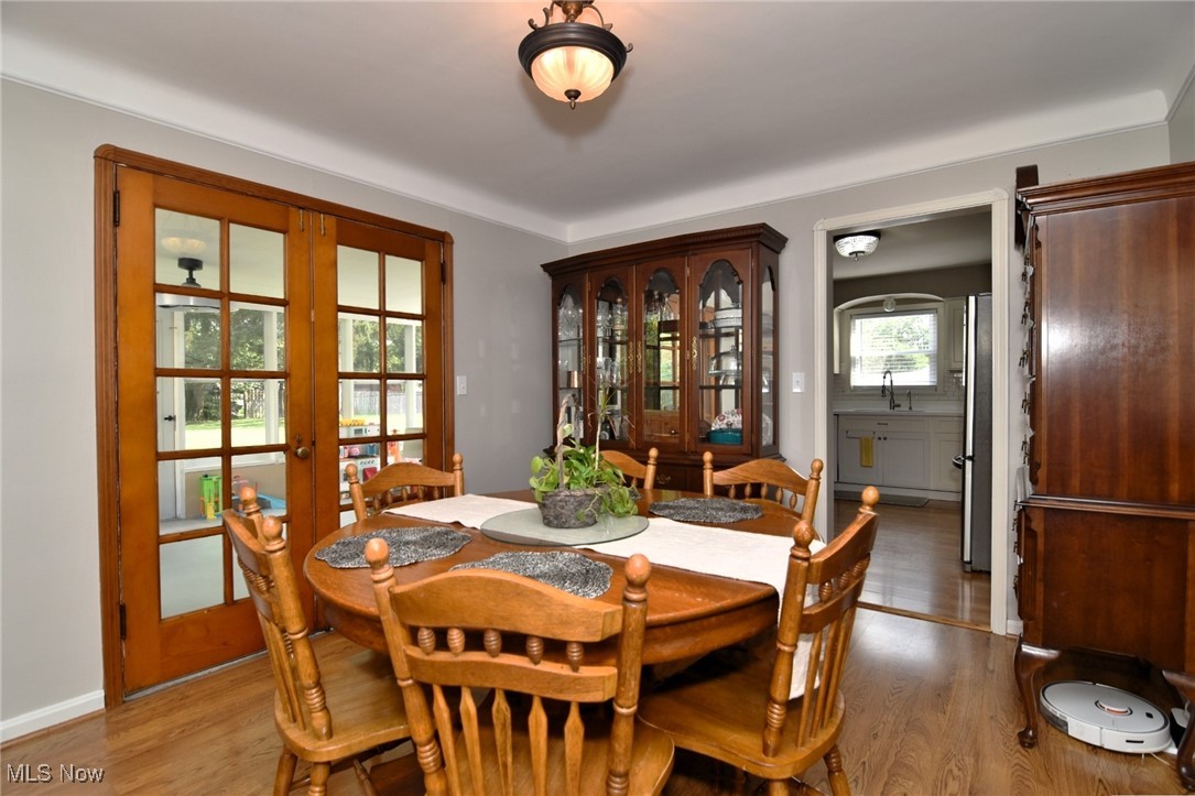 6525 East Pleasant Valley Road Independence, OH 44131 - Photo 7 of 38 Dining room with french doors to sun room.