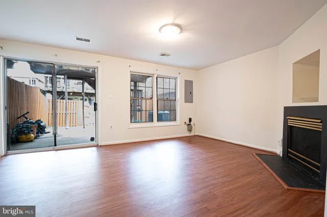 a view of livingroom with hardwood floor and a ceiling fan