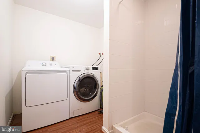 a utility room with dryer and washer