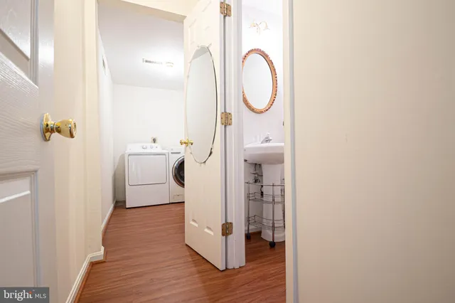 a view of a bathroom from a hallway
