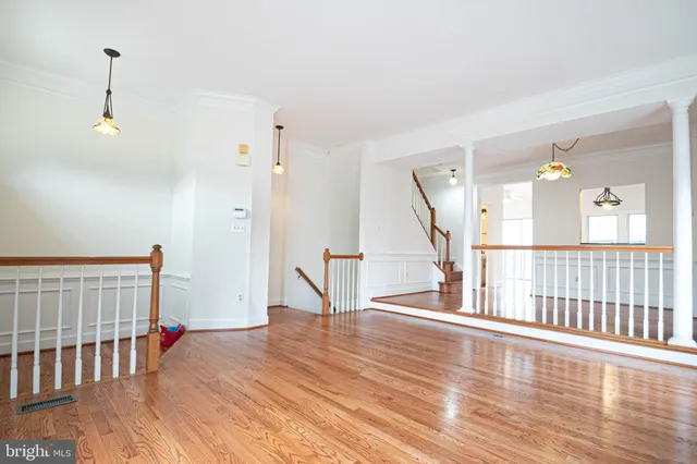 a view of entryway with wooden floor