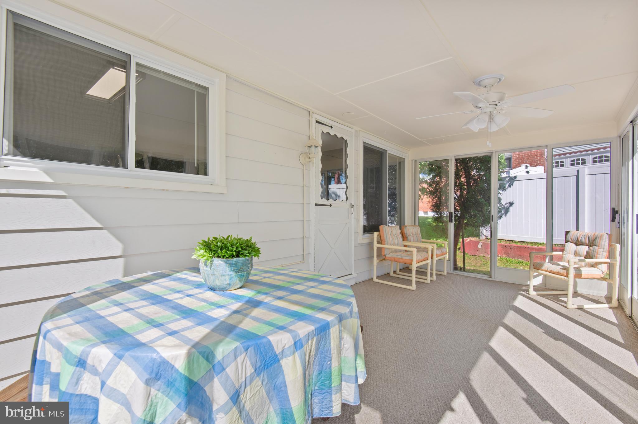 8403 Kings Ridge Road Parkville, MD 21234 - Photo 14 of 41 Sunroom - Perfect for Summer Evenings!