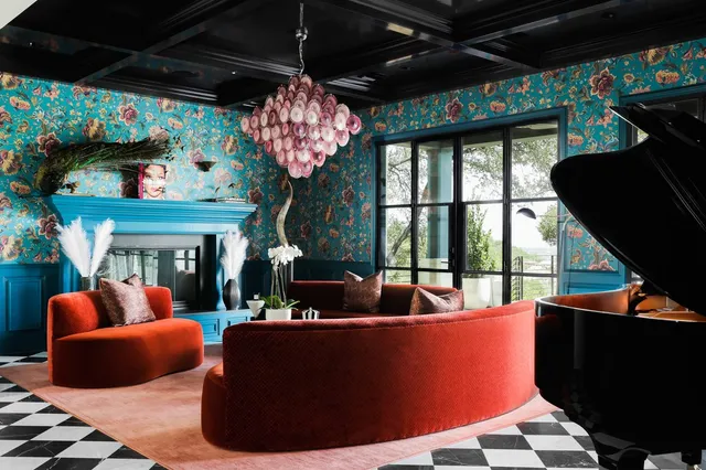 a view of an outdoor dining space with a table and chairs