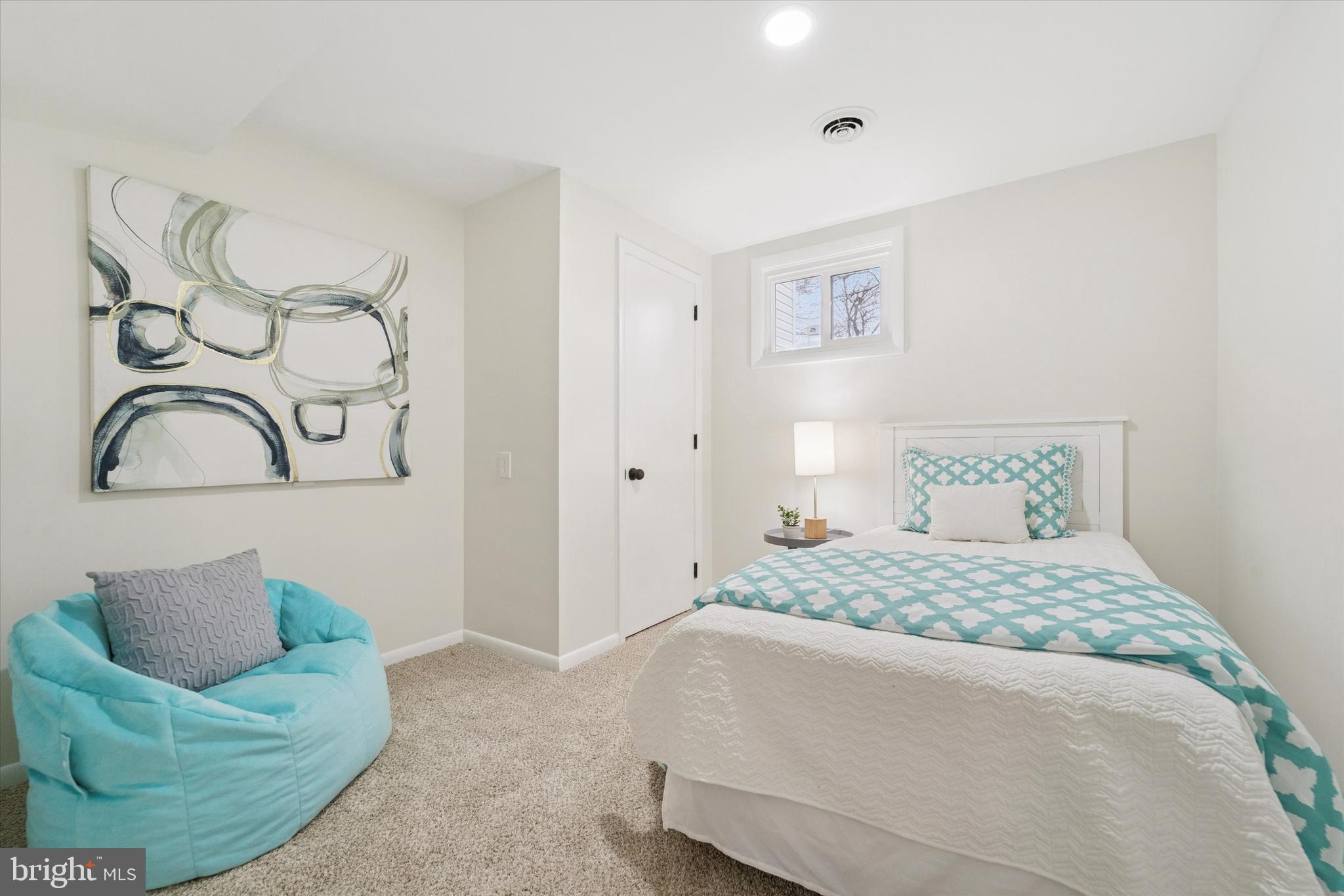 2672 Crownview Road Pottstown, PA 19464 - Photo 18 of 25 a bedroom with a bed and couch