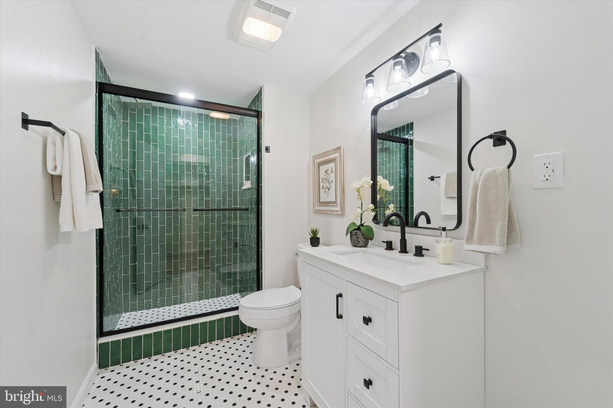 2672 Crownview Road Pottstown, PA 19464 - Photo 19 of 25 a bathroom with a sink toilet and shower