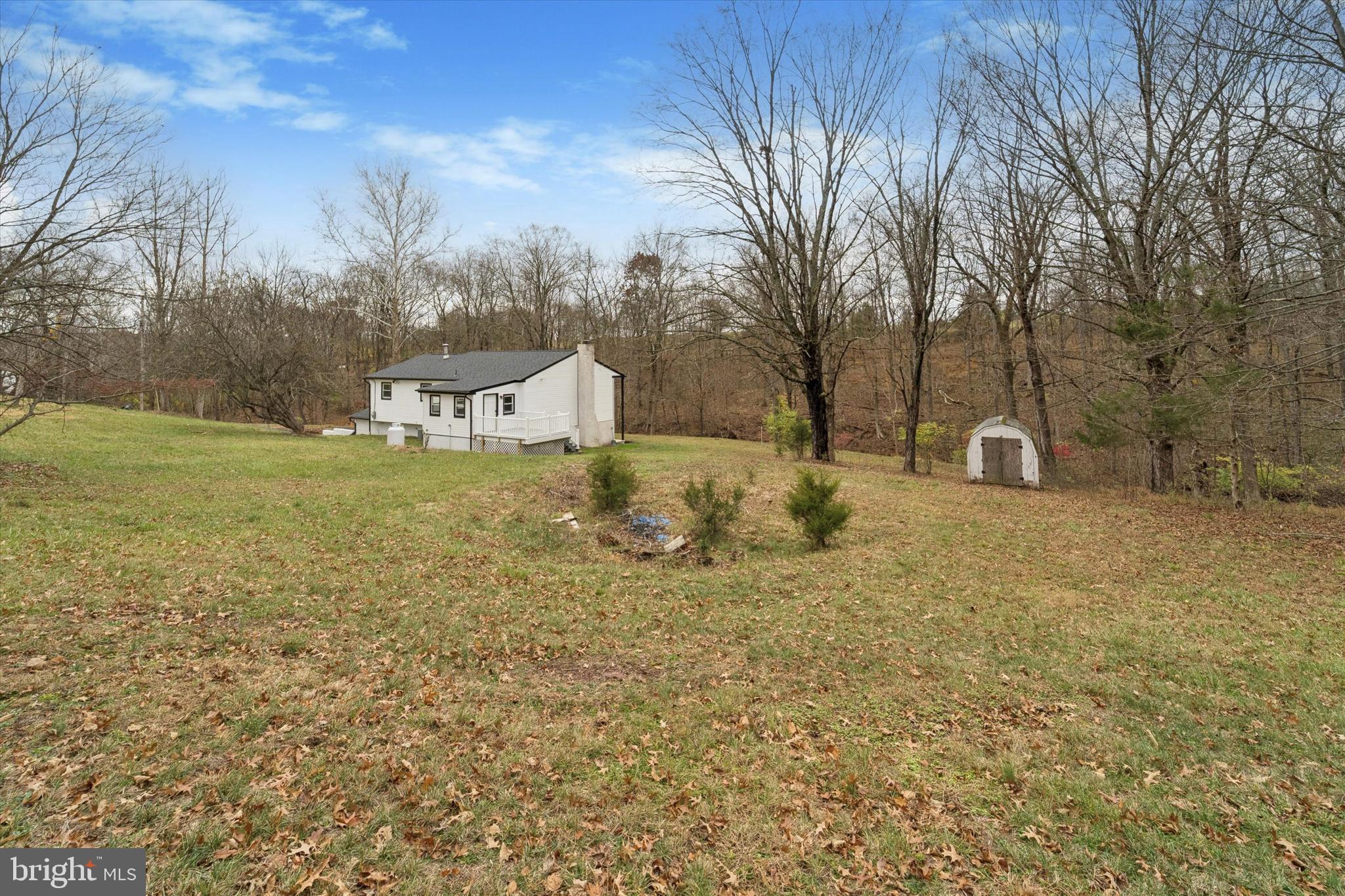 2672 Crownview Road Pottstown, PA 19464 - Photo 23 of 25 a front view of a house with a yard