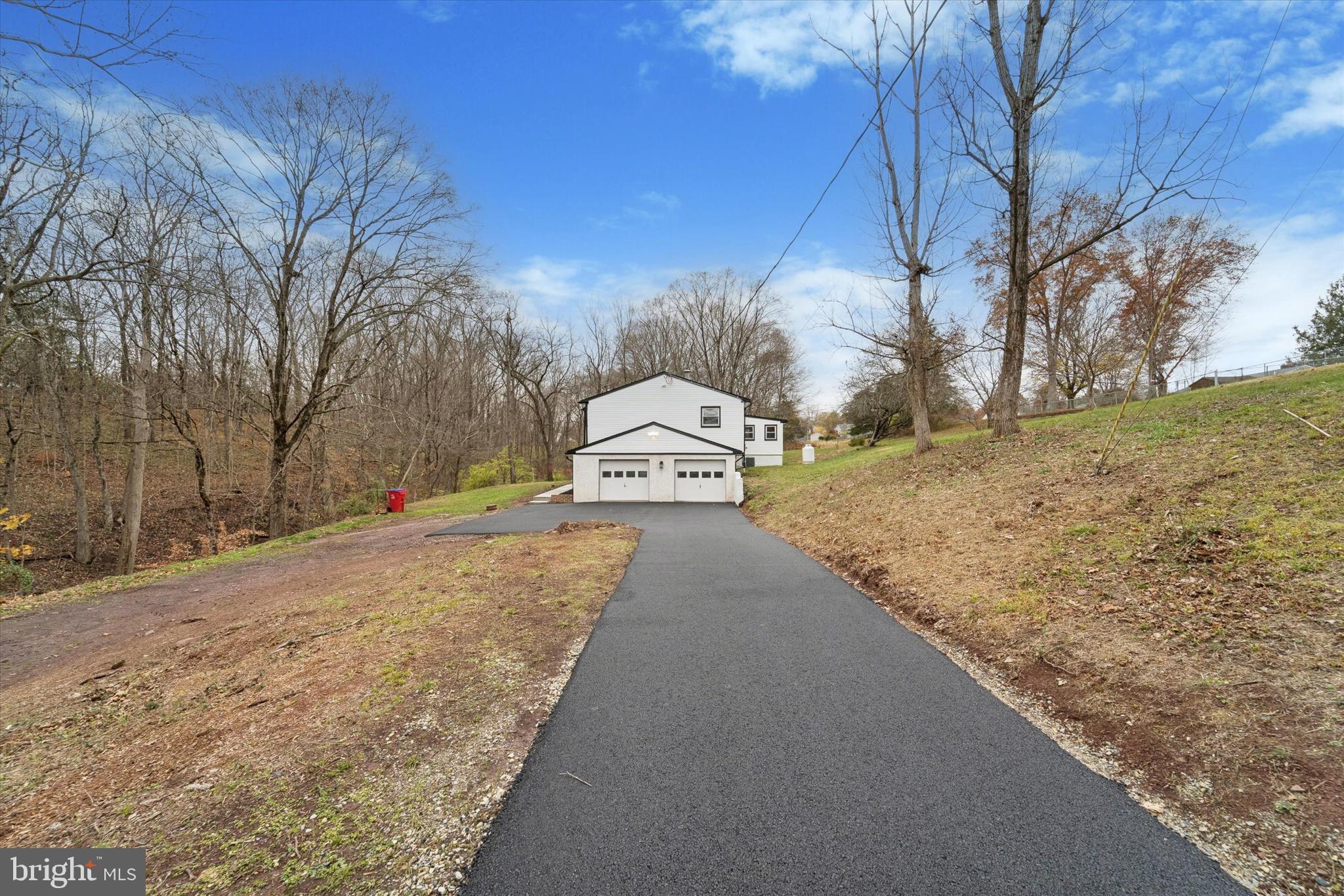 2672 Crownview Road Pottstown, PA 19464 - Photo 24 of 25 a view of road with large trees