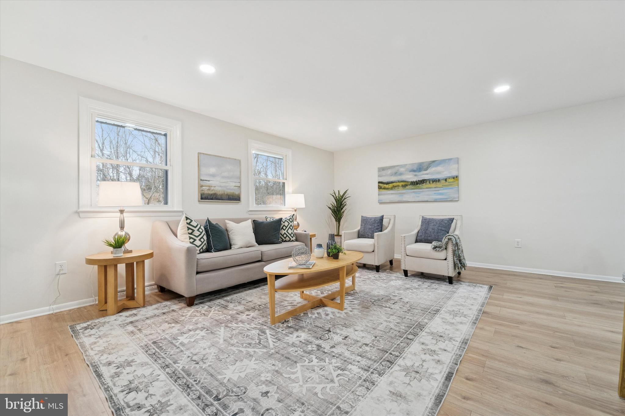 2672 Crownview Road Pottstown, PA 19464 - Photo 4 of 25 a living room with furniture and wooden floor