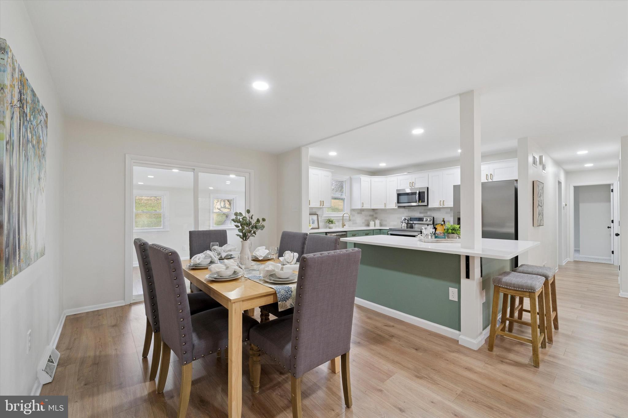 2672 Crownview Road Pottstown, PA 19464 - Photo 6 of 25 a dining room with furniture and wooden floor