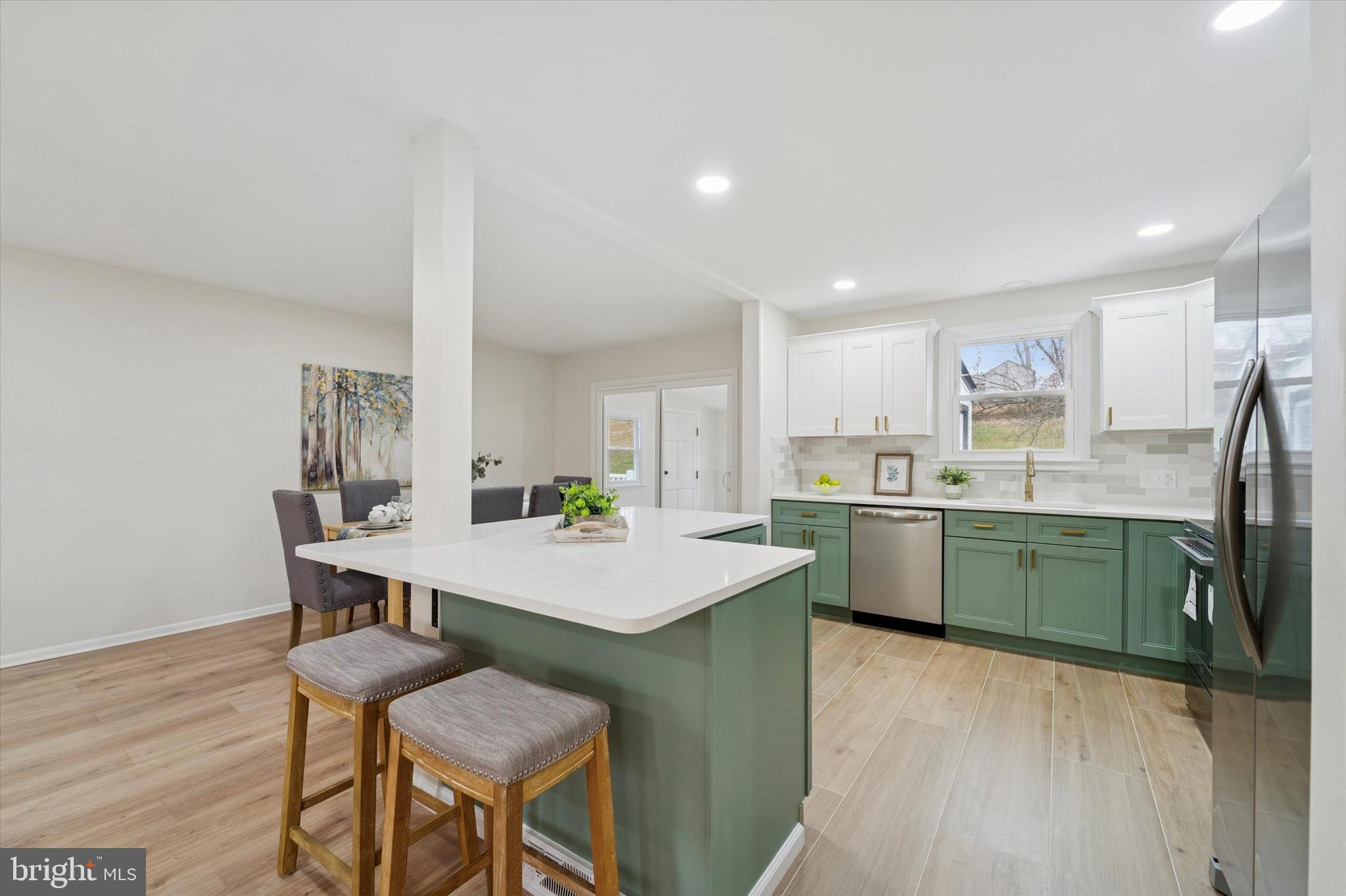 2672 Crownview Road Pottstown, PA 19464 - Photo 7 of 25 a kitchen with a table and chairs in it