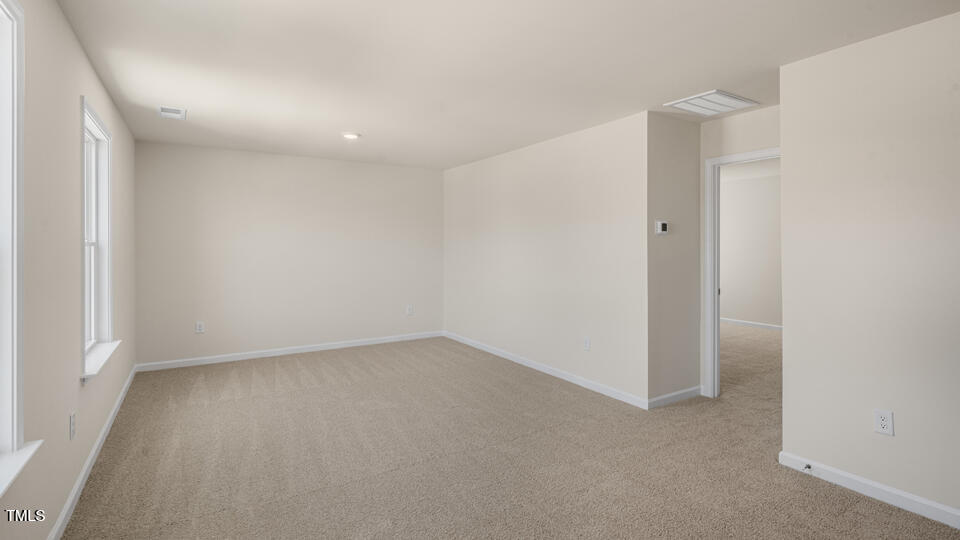 154 Red Jasper Way Clayton, NC 27520 - Photo 16 of 33 a view of an empty room
