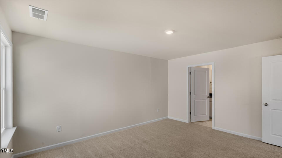 154 Red Jasper Way Clayton, NC 27520 - Photo 26 of 33 a view of an empty room