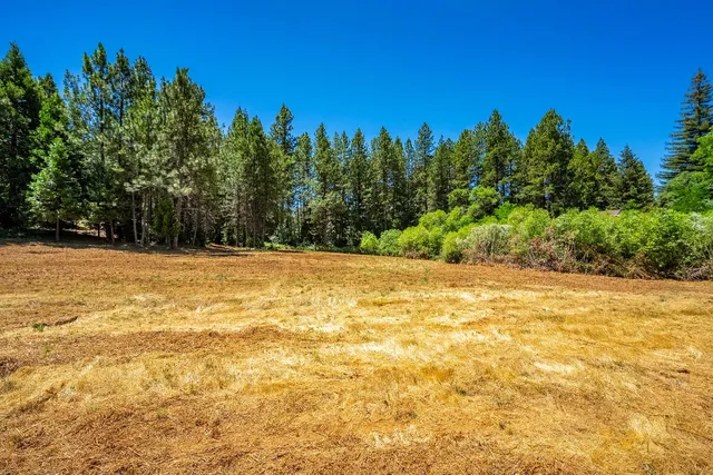 a view of swimming pool with an outdoor space and seating area
