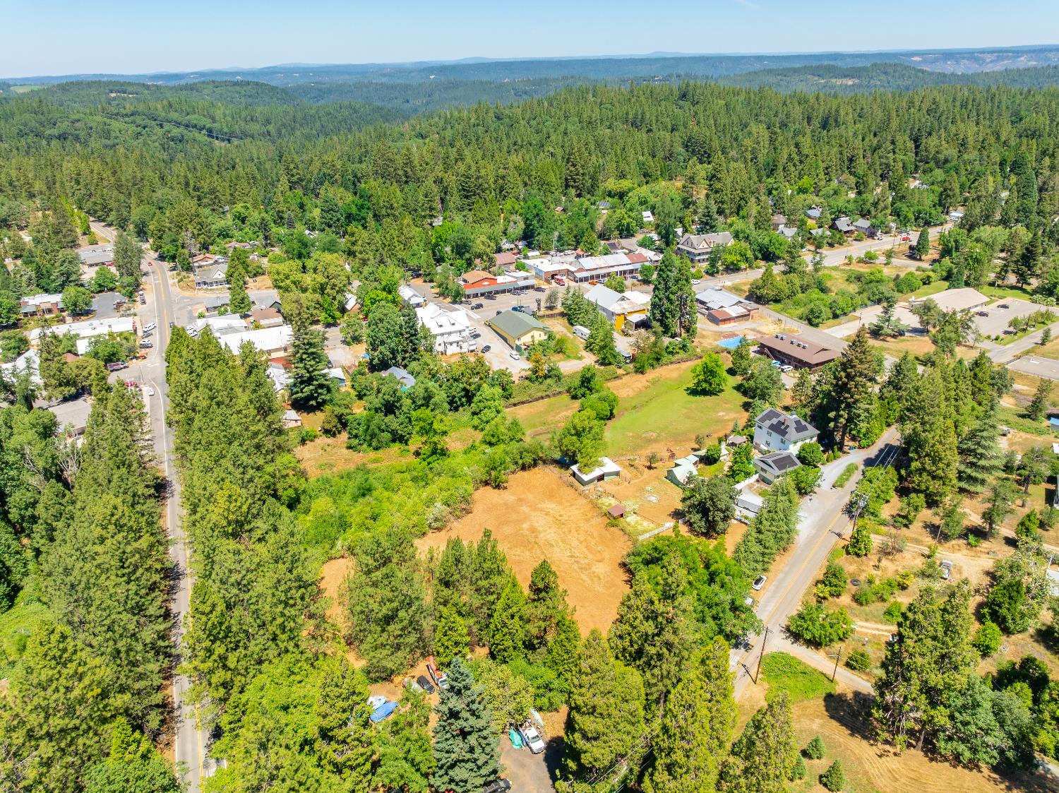 3238 South Street Georgetown, CA 95634 - Photo 10 of 15 a view of a city with lush green forest