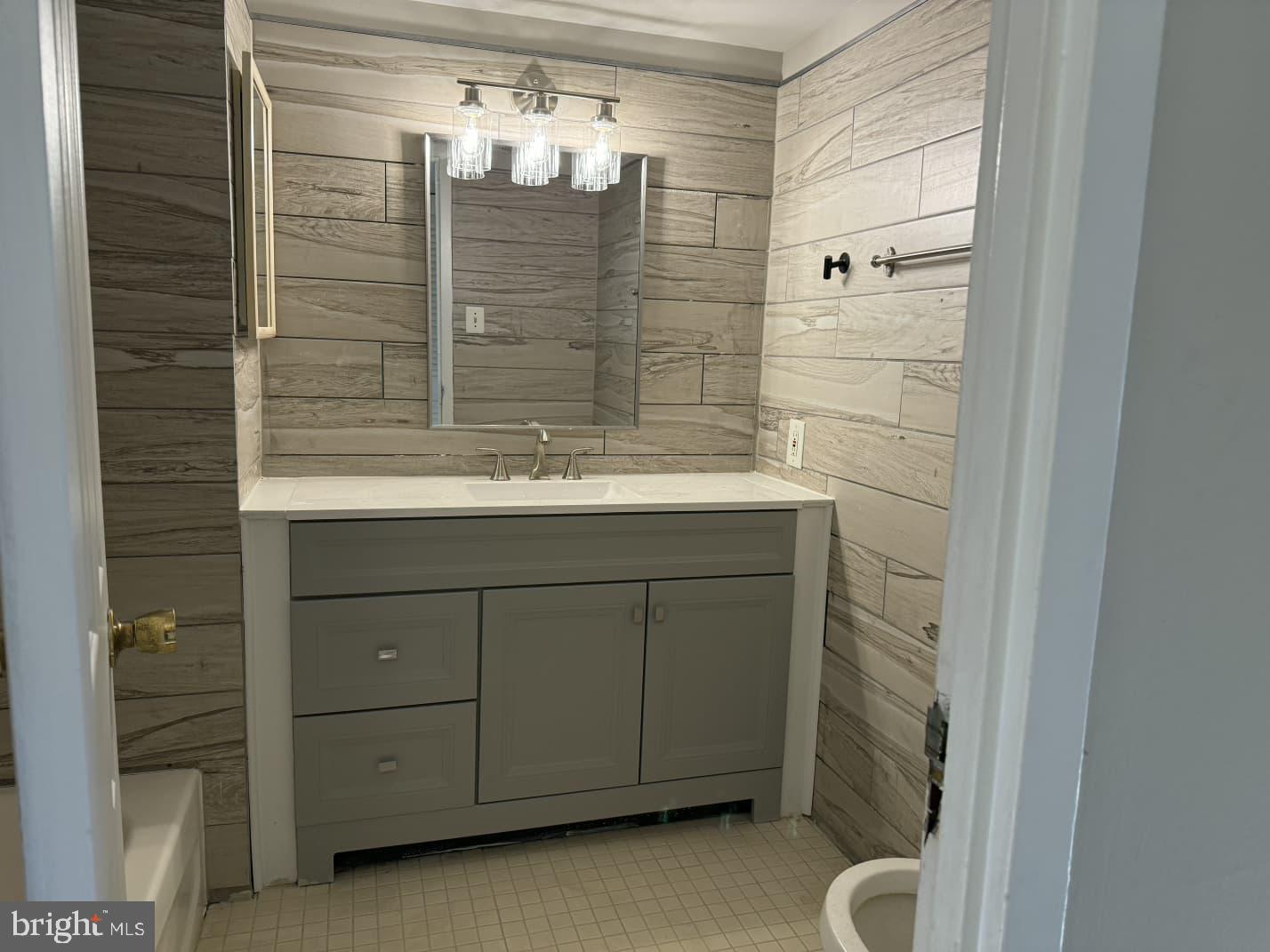 2630 Fort Farnsworth Road, Unit 148 Alexandria, VA 22303 - Photo 11 of 12 a bathroom with a sink and a mirror