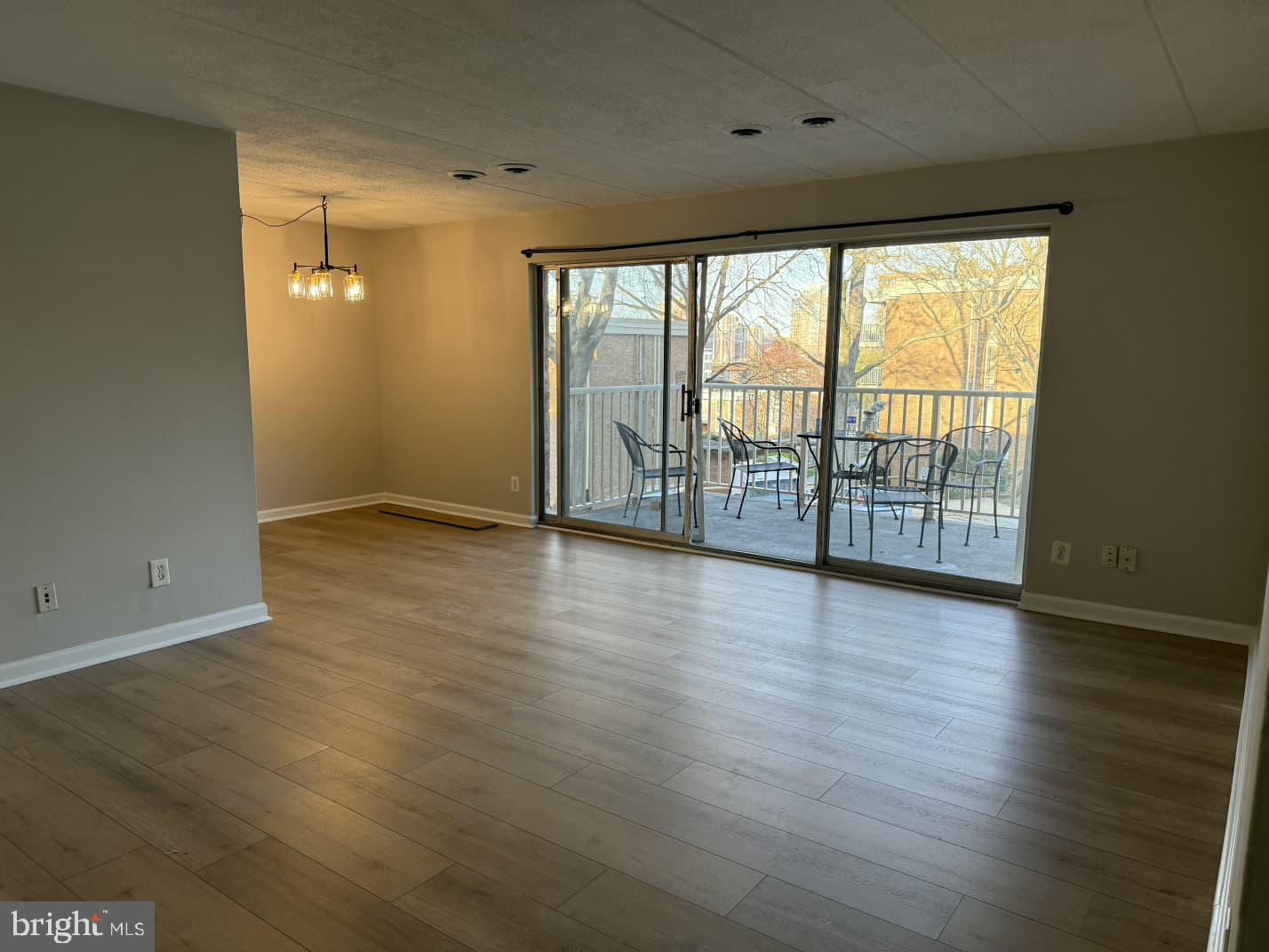 2630 Fort Farnsworth Road, Unit 148 Alexandria, VA 22303 - Photo 5 of 12 wooden floor in an empty room with a window