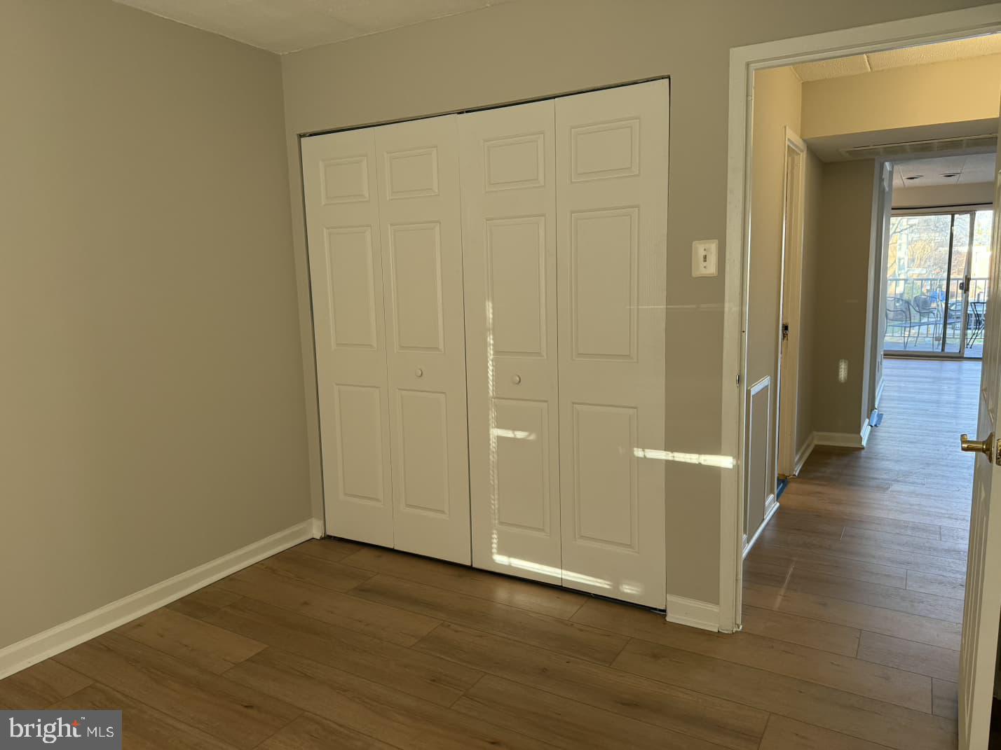 2630 Fort Farnsworth Road, Unit 148 Alexandria, VA 22303 - Photo 8 of 12 a view of a room with wooden floor