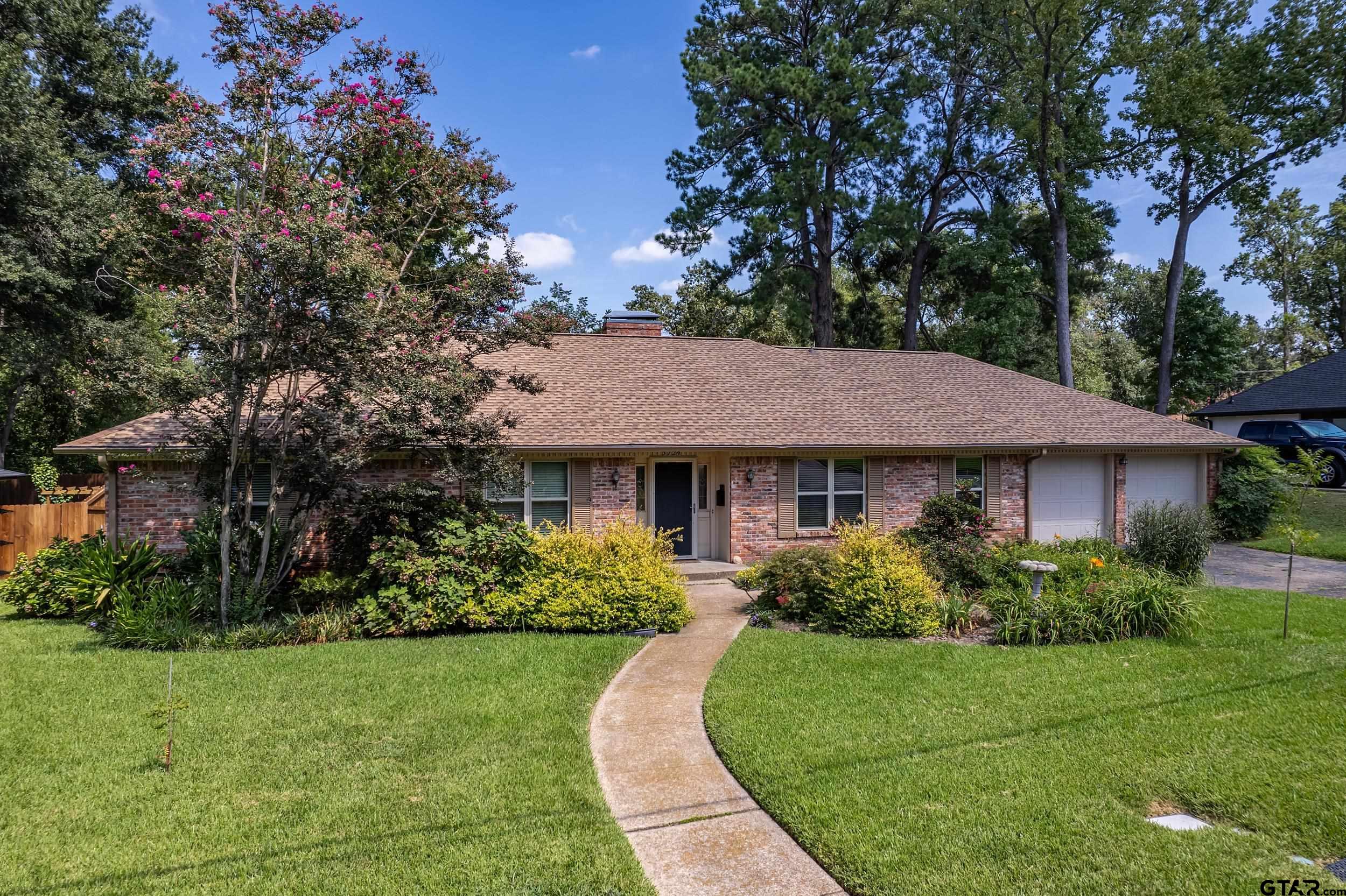 a view of a house with garden