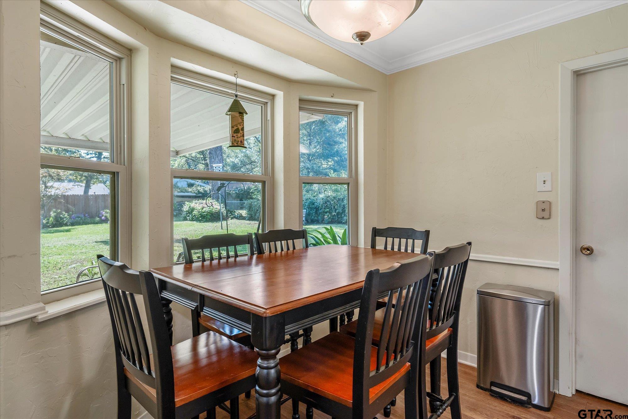 3724 Pollard Drive Tyler, TX 75701 - Photo 15 of 28 a view of a dining room with furniture window and outside view