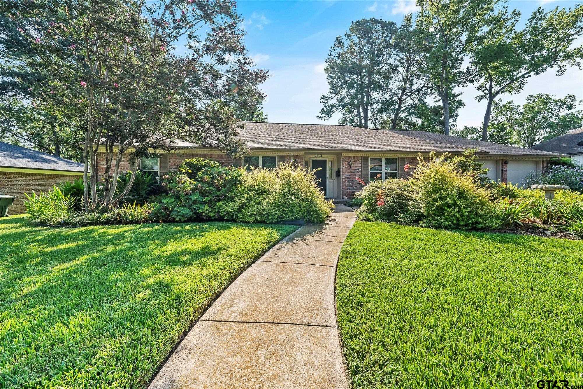 3724 Pollard Drive Tyler, TX 75701 - Photo 27 of 28 a front view of house with yard and green space