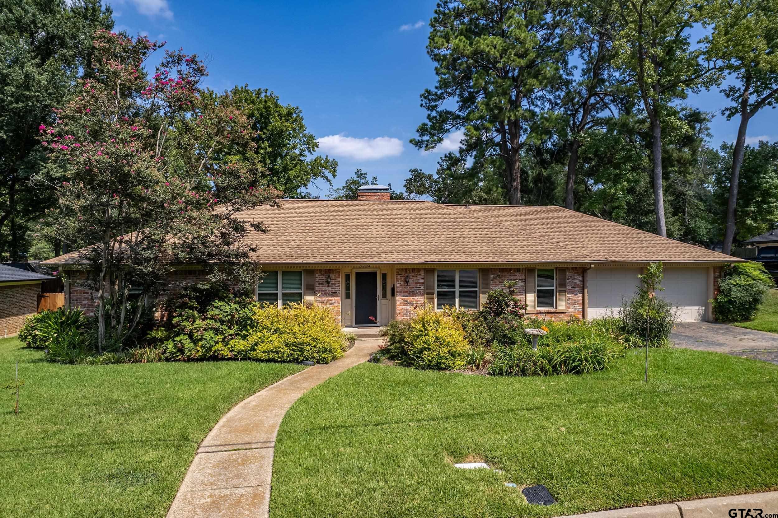 3724 Pollard Drive Tyler, TX 75701 - Photo 28 of 28 a view of a house with garden