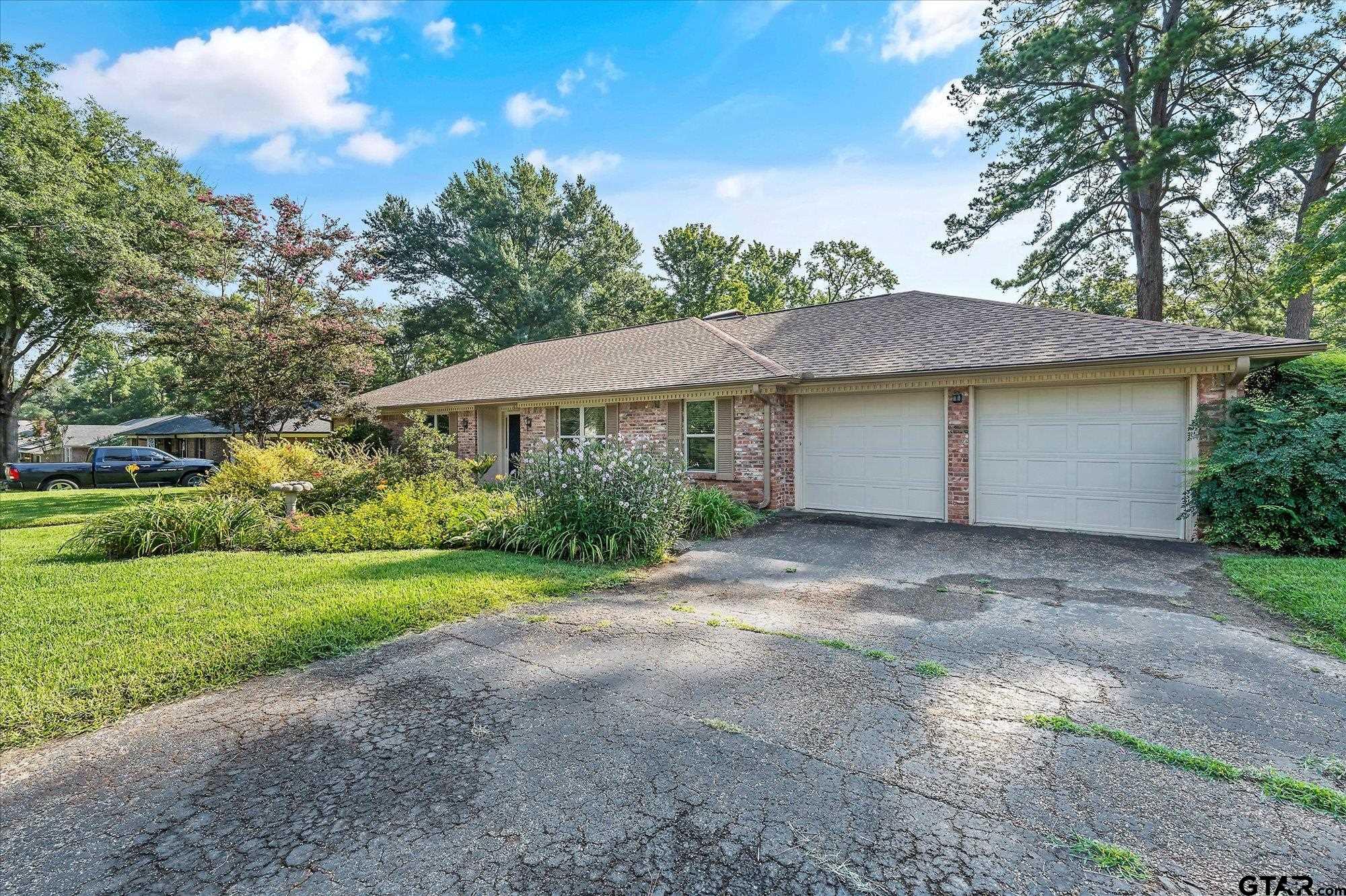 3724 Pollard Drive Tyler, TX 75701 - Photo 4 of 28 a view of a house with a yard and tree