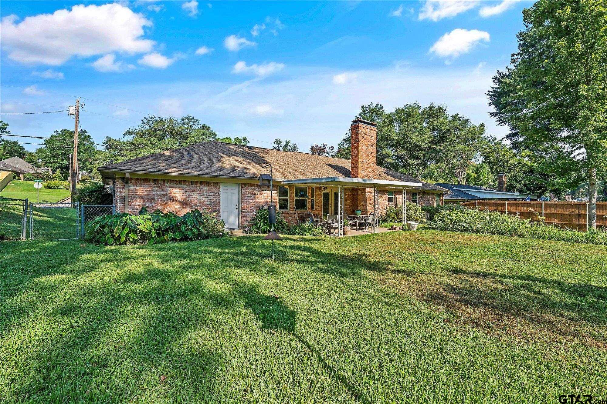 3724 Pollard Drive Tyler, TX 75701 - Photo 5 of 28 a front view of a house with a yard