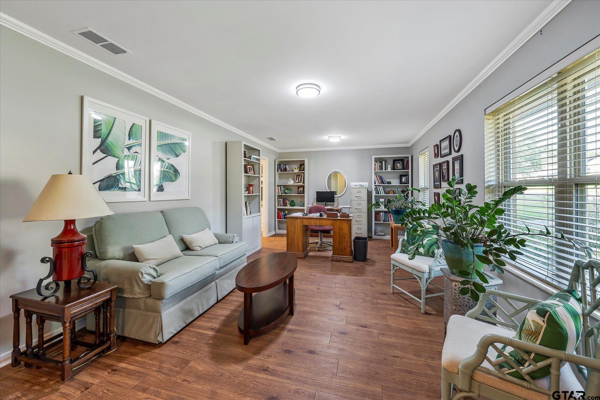 3724 Pollard Drive Tyler, TX 75701 - Photo 7 of 28 a living room with furniture and a window