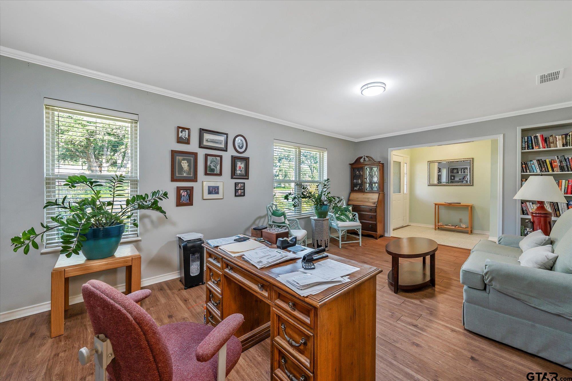 3724 Pollard Drive Tyler, TX 75701 - Photo 8 of 28 a living room with furniture and a potted plant