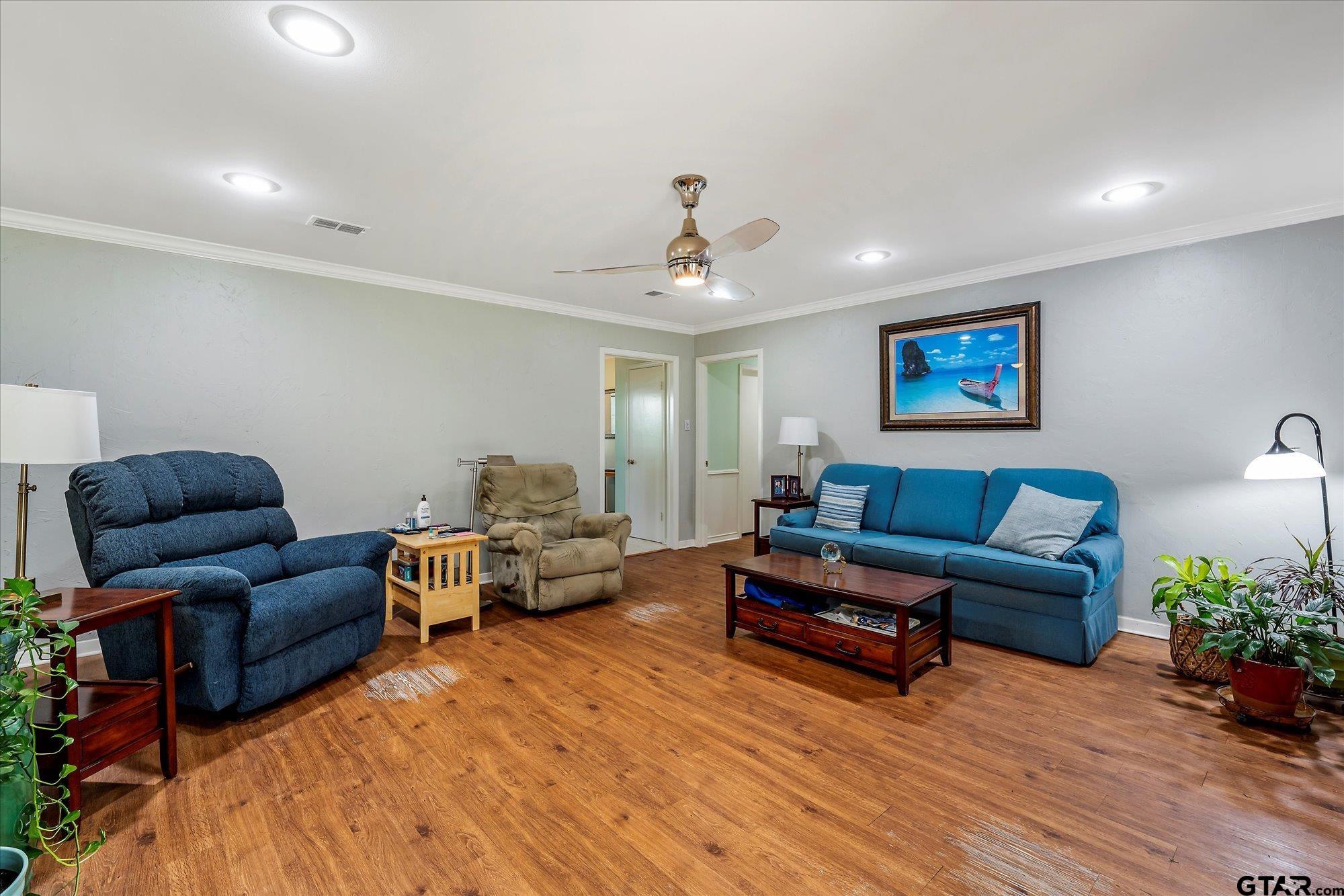 3724 Pollard Drive Tyler, TX 75701 - Photo 10 of 28 a living room with furniture and wooden floor